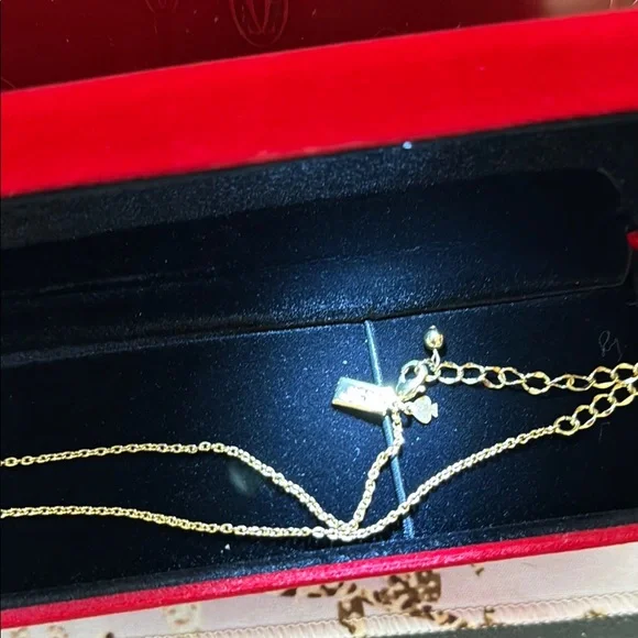 Kate Spade Gold and Red Charm Necklace - Picture 3 of 3